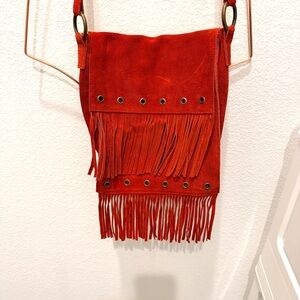 Red suede leather‎ double fringed hobo shoulder bag. More red than orange.